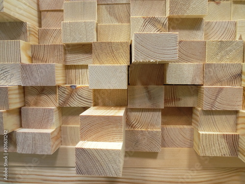 the ends of the wooden blocks, collected neatly in a stack