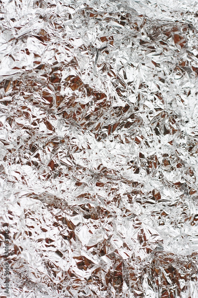 Beautiful silver foil background close up view Beautiful silver foil background close up view