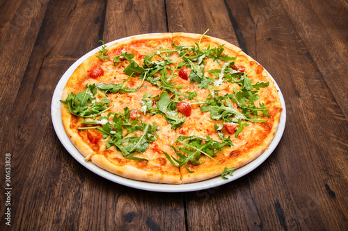 classic Italian pizza on a wooden table