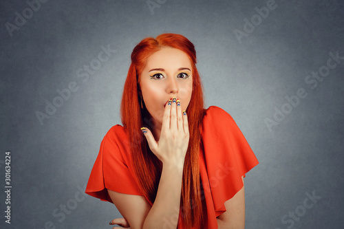 Surprised woman expression with wide opened eyes