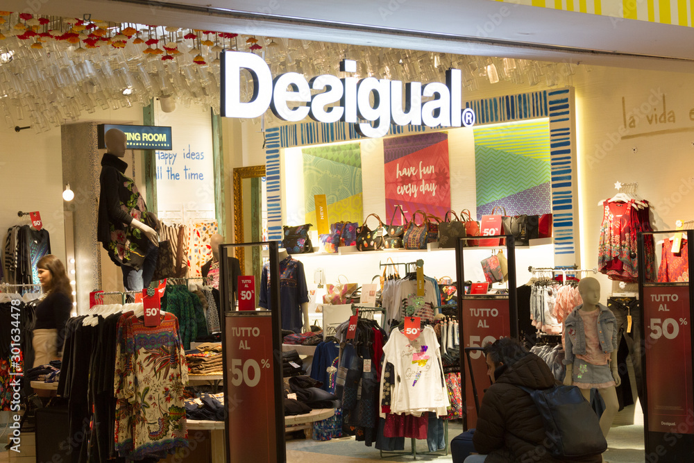 Milan, Italy. 14/02/2018. Desigual shop at the Milano Bergamo Airport.  Stock Photo | Adobe Stock