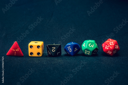 dice set of 6 line up on table with 1 facing up photo