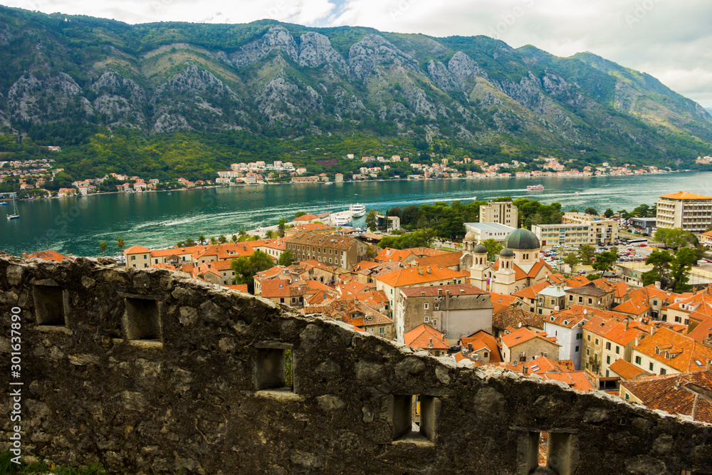 Montenegro, Kotor, 09 October, 2019. View of Bas-relief (low relief) on old Kotor walls of the old town and ancient walls of Kotor Fort (St John Fortress) and Chapel of Our Lady of Salvation