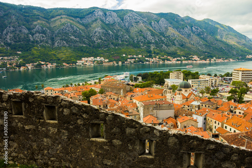 Montenegro, Kotor, 09 October, 2019. View of Bas-relief (low relief) on old Kotor walls of the old town and ancient walls of Kotor Fort (St John Fortress) and Chapel of Our Lady of Salvation