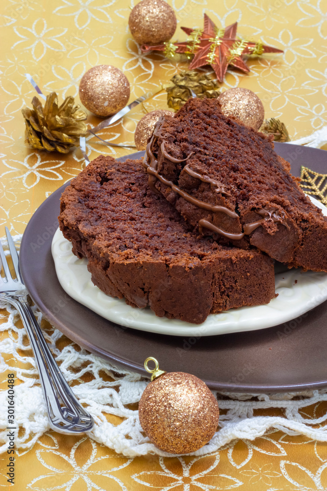 Pieces of Chocolate Banana Cake Soft toned. Selective focus. New Year and Christmas concept.