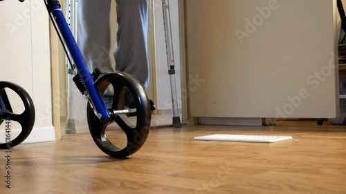 Person Using Crutches Walks Toward Camera From Out of Sigh photo