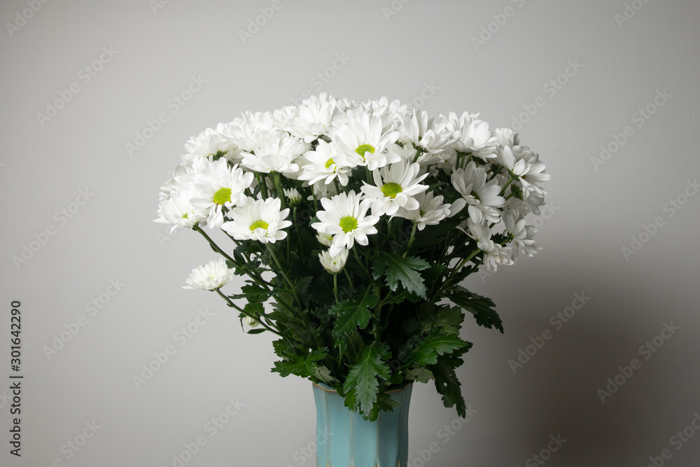 Bouquet of white chrysanthemums flowers in a vase