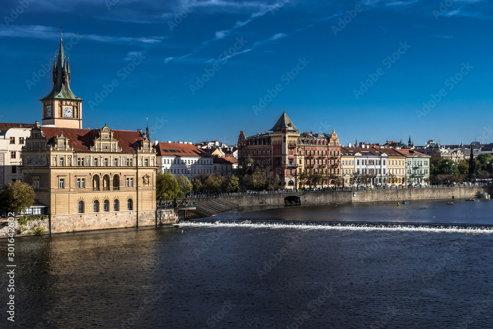 Moldova River And Historic Buildings In Prague In The Czech Republic