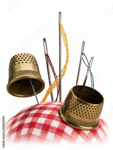 Pillow for sewing needles and a thimble