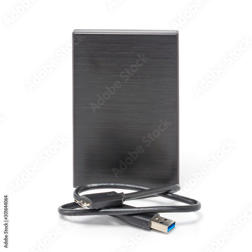 External black hard drive disc with usb 3.0 cable. Best way of data storage on portable hdd. Close up front view isolated on white background.