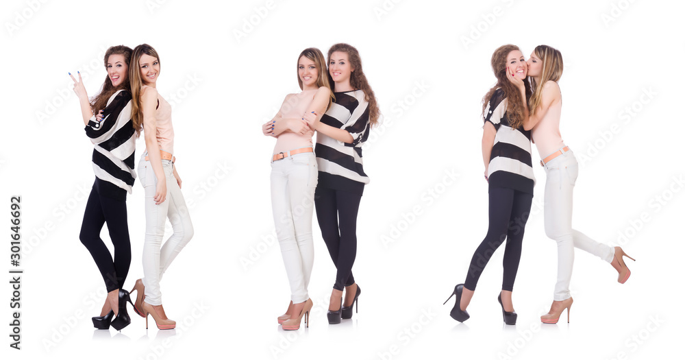 Fototapeta premium Two female friends isolated on the white
