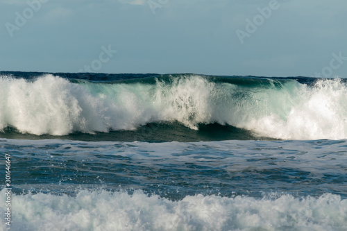 Ocean waves breaking on a windy day stock photo
