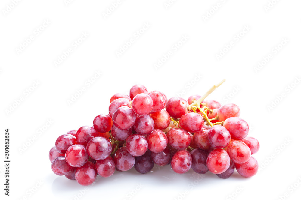 Fresh red bunch of grapes isolated on white background