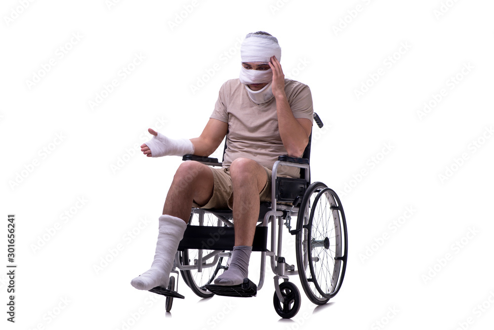 Injured man in wheel-chair isolated on white Injured man in wheel-chair isolated on white