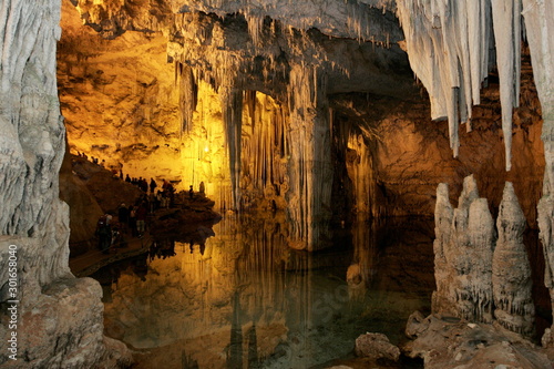 Scenic view of Neptune's cave (Grotte di Nettuno) is a stalactite cave near the town of Alghero, Capo Caccia  photo
