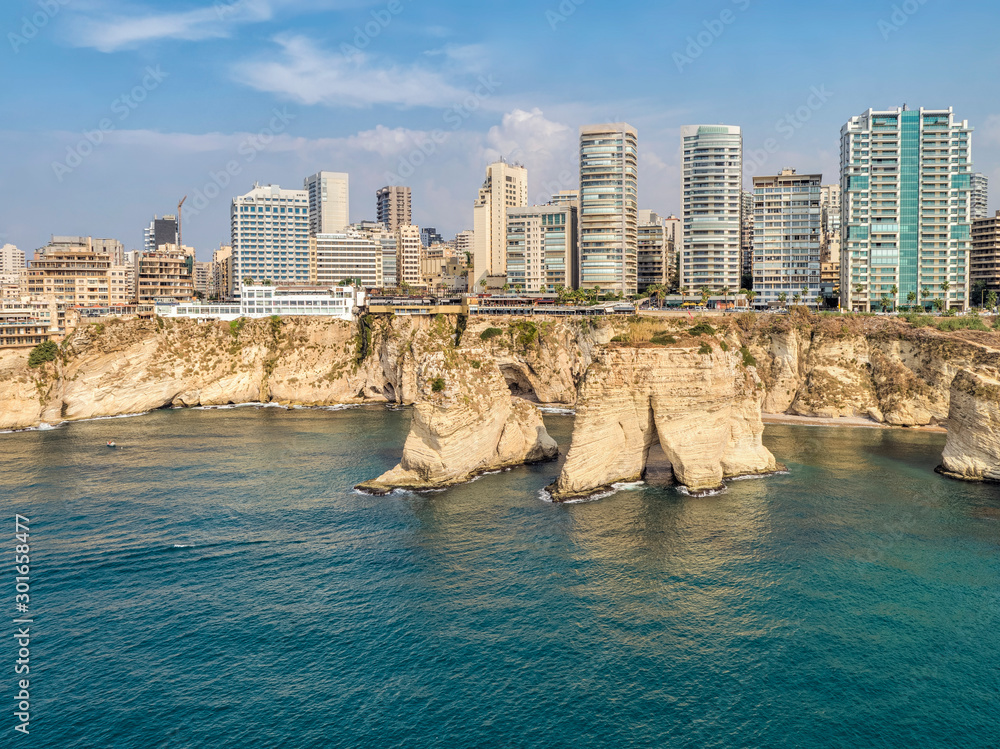 Fototapeta premium Rouche rocks in Beirut, Lebanon in the sea during daytime. Pigeon Rocks in Mediterranean sea.