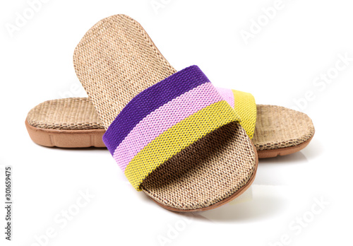 Slippers woven on white background photo