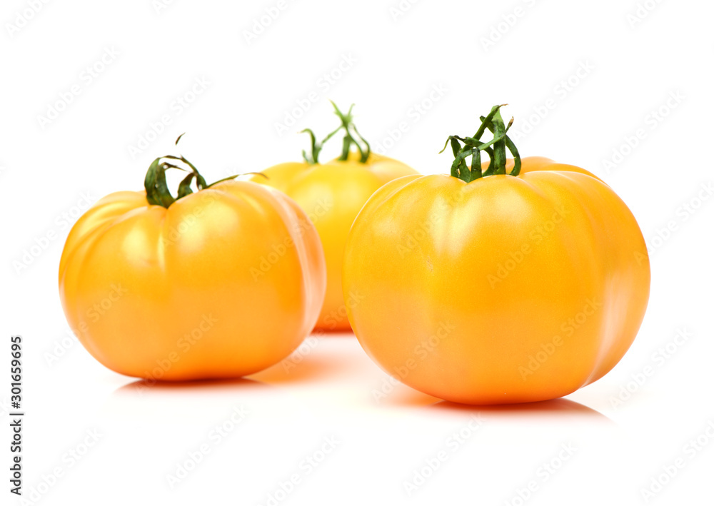 fresh yellow tomatoes on white background