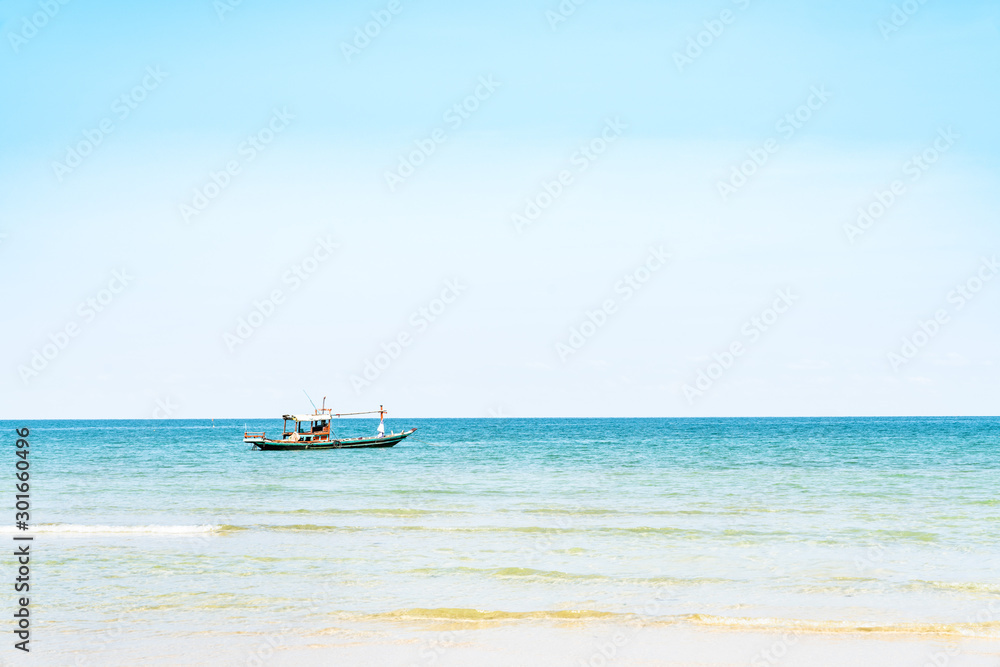 Coastal fishing boats with sea view and blue sky in summer Coastal fishing boats with sea view and blue sky in summer