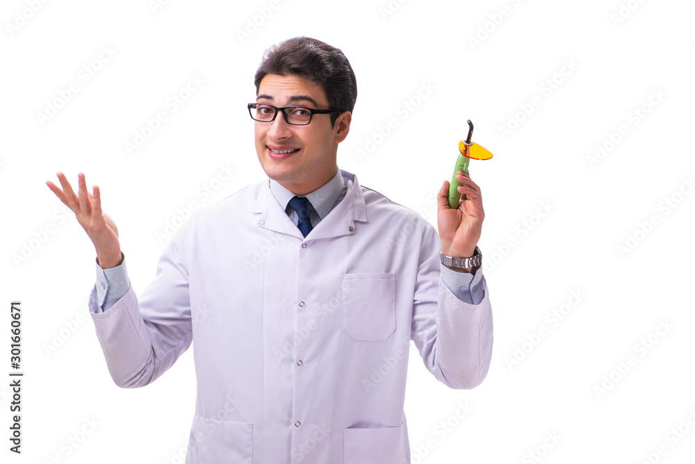 Young male doctor stomatologist isolated on white Young male doctor stomatologist isolated on white