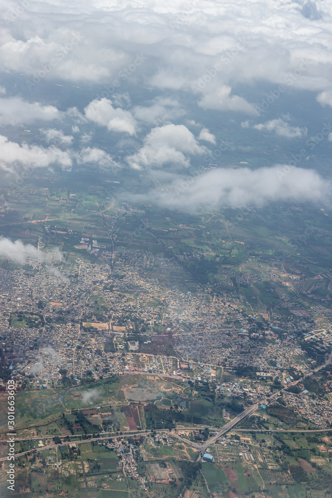 Bangalore to Pune, , a view of a city with a mountain in the background