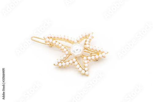 Luxury star shape hair clip on white isolated background.
