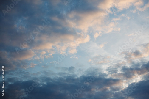 Blue sky, pink clouds, sunset.