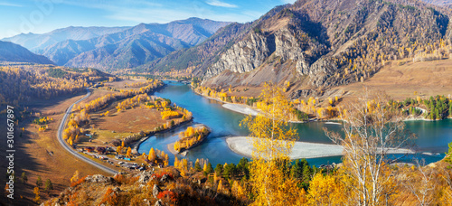 Wild Katun river in Altai mountains. Bright, sunny landscape. Panoramic autumn view.