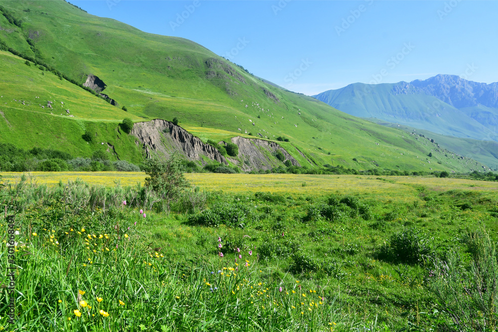 Russia, North Ossetia. Blue sky over the valley  Midagrabin in the summer
