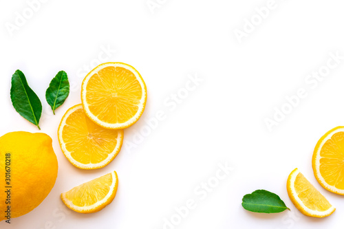 slices of orange and lemon isolated on white
