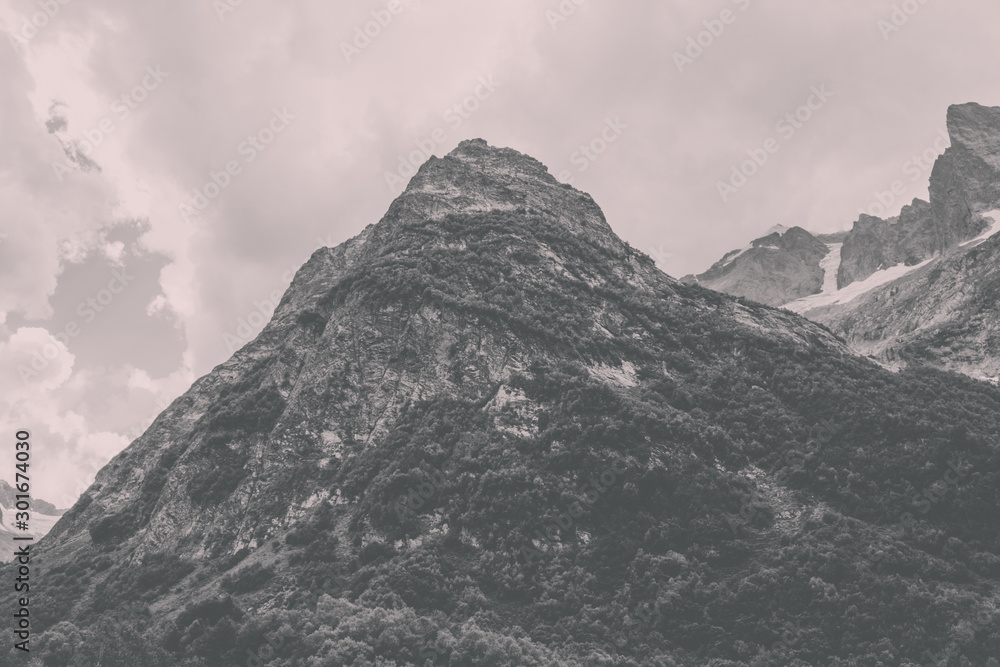 Panorama view on mountains scene in national park of Dombay, Caucasus