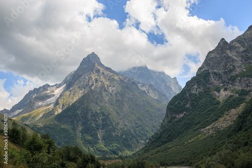 Panorama view on mountains scene in national park of Dombay, Caucasus