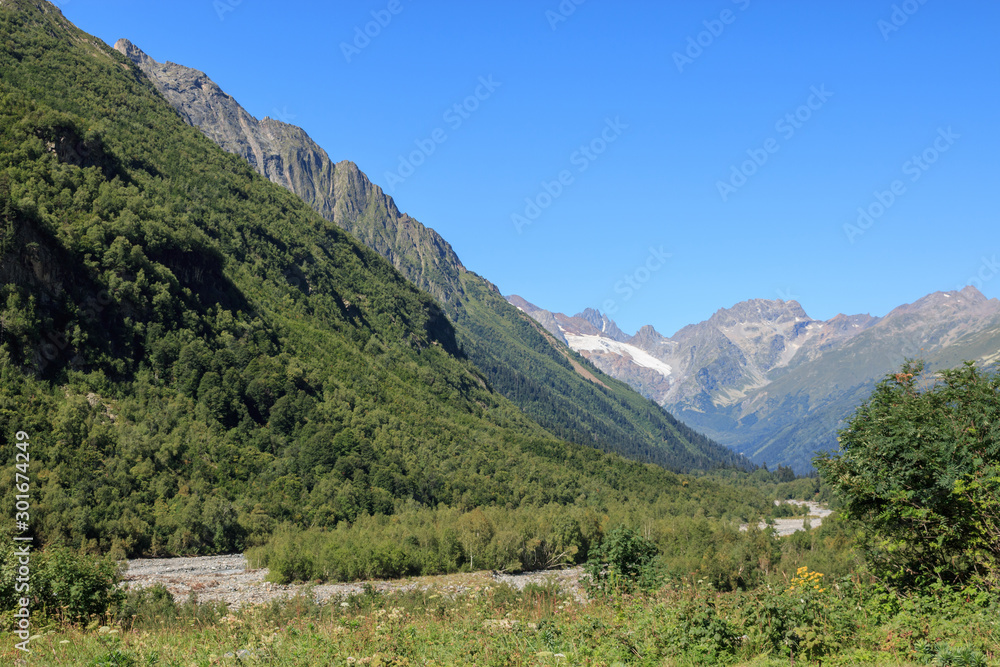 Panorama view of mountains scenes in national park Dombay, Caucasus