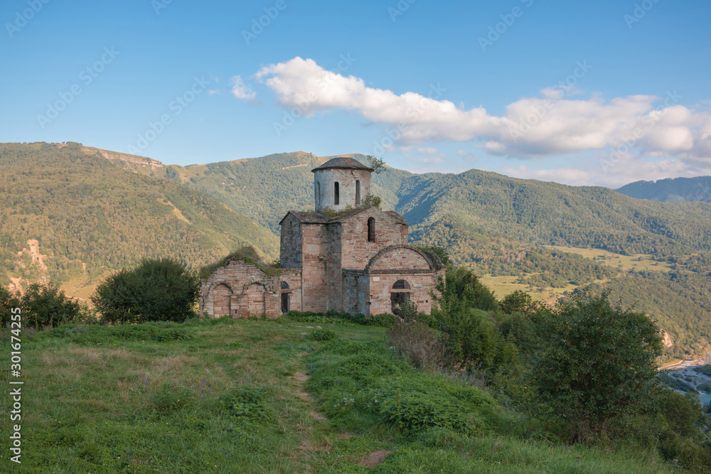 Old church in mountains, in national park Dombai, Caucasus, Russia Old church in mountains, in national park Dombai, Caucasus, Russia