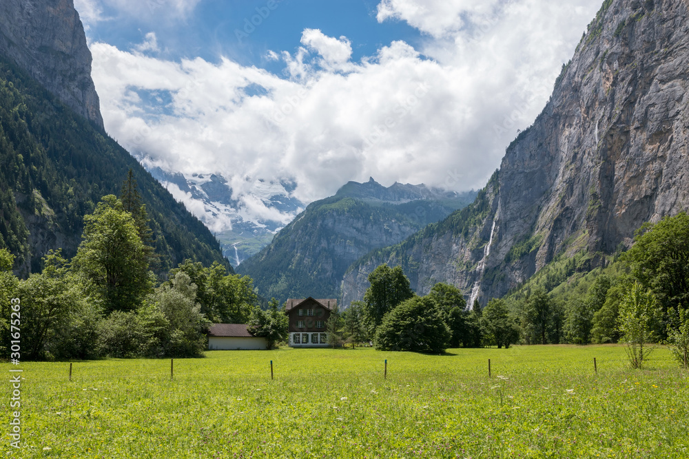 View valley of waterfalls in national park of city Lauterbrunnen, Switzerland