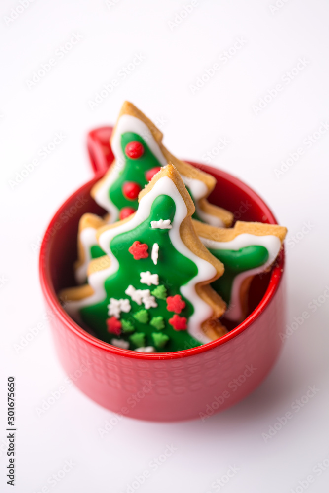 Christmas shortbread trees cookies with coloured  sprinkles