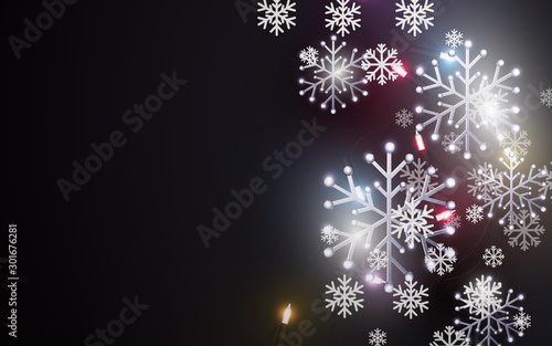 Merry Christmas and Happy New Year banner. Abstract silver snowflakes and color light on dark background. Paper art and craft design. Space for your design