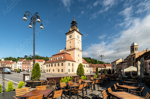 The famous Sfatului square in the heart of Brasov medieval old town in Romania on a sunny summer day photo