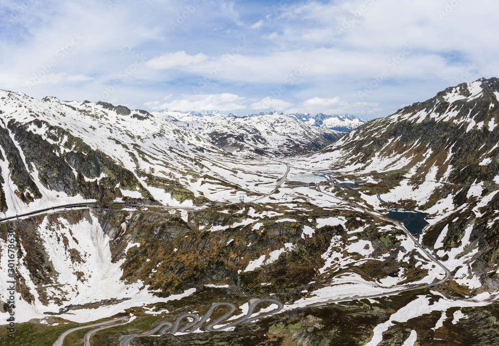 Stunning aerial view of the Gotthard pass and road in the swiss alps between the Canton of Ticino and Uri in Switzerland