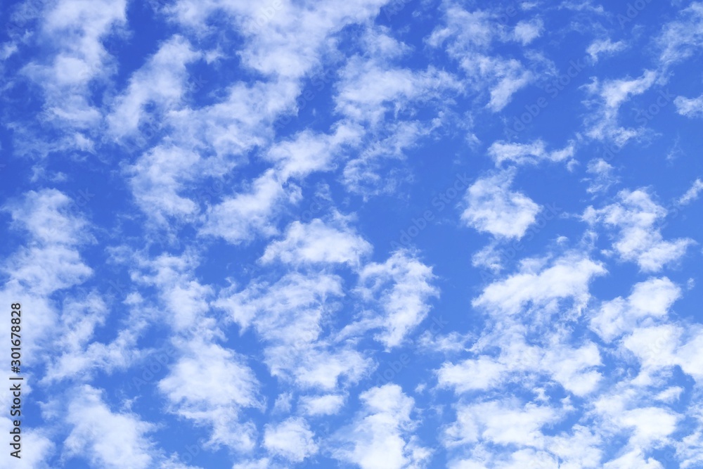 Beautiful Blue Sky with Fluffy White Clouds