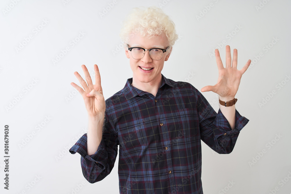 Young albino blond man wearing casual shirt and glasses over isolated white background showing and pointing up with fingers number nine while smiling confident and happy. Young albino blond man wearing casual shirt and glasses over isolated white background showing and pointing up with fingers number nine while smiling confident and happy.