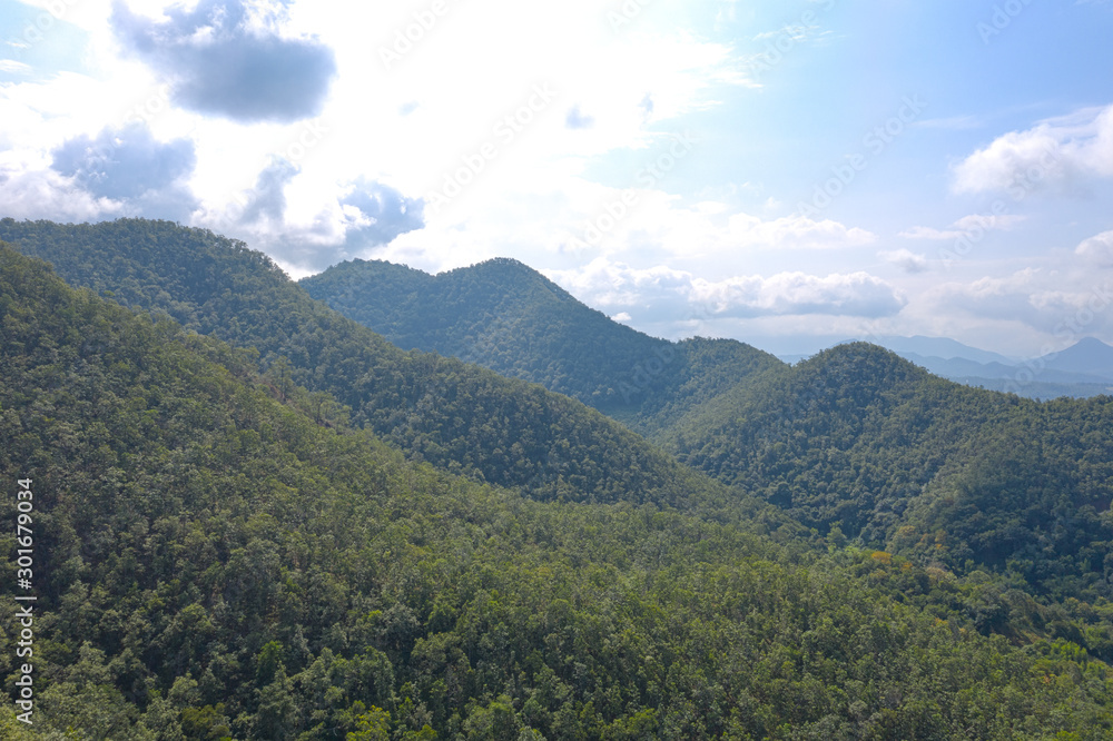 A beautiful mountain range with green trees in Pai city at Mae Hon Son, Thailand.