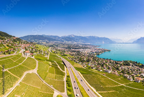 Fotografi Stunning aerial view of the famous Lavaux vineyard by Vevey and lake Geneva in C