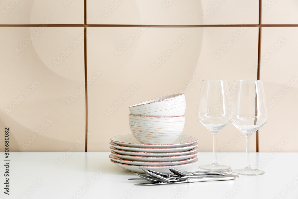 Set of clean dishware on table Set of clean dishware on table