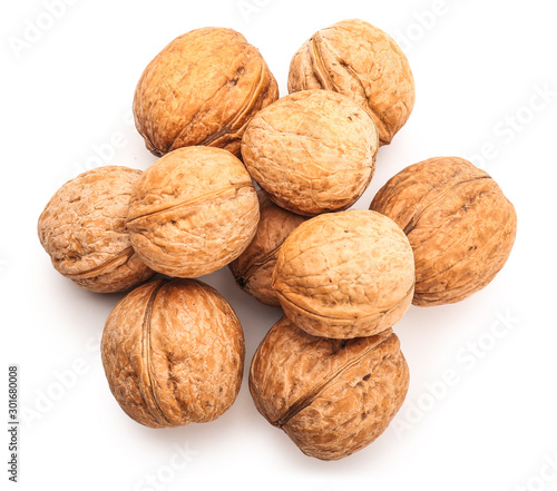 Tasty walnuts on white background