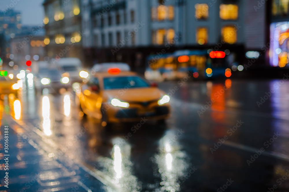 Wet night city street rain Bokeh reflection bright colorful lights puddles sidewalk Car