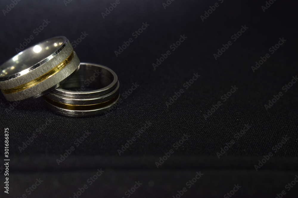 Two rings of gold and white gold are elegant and expensive and are a fine work for teenagers. Two rings of gold and white gold are elegant and expensive and are a fine work for teenagers.