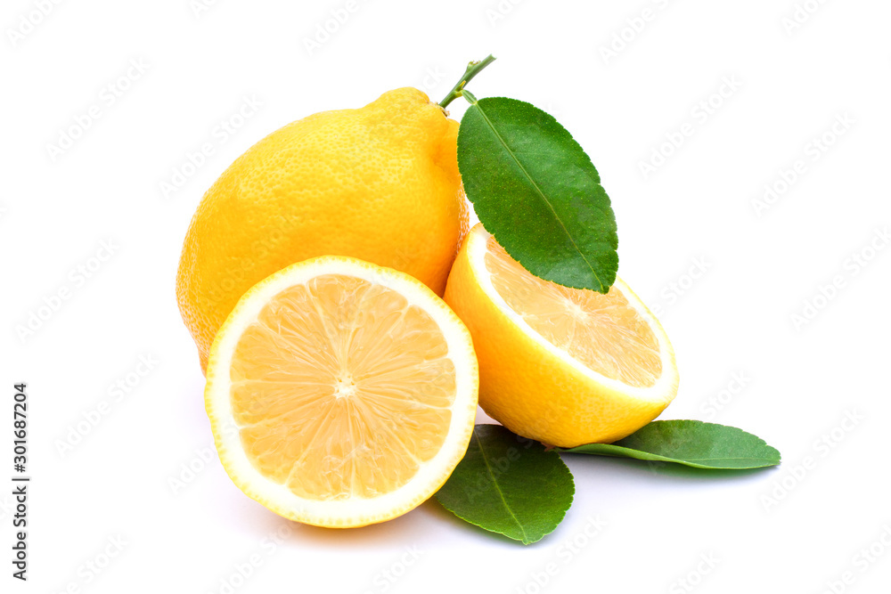 Closeup two fresh ripe organic yellow lemon fruits with water drops, green leaf and cut in half slice isolated on white background with clipping path. Healthy fruit and food concept. Closeup two fresh ripe organic yellow lemon fruits with water drops, green leaf and cut in half slice isolated on white background with clipping path. Healthy fruit and food concept.