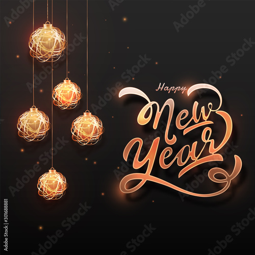 Calligraphy of Happy New Year with hanging baubles decorated on black background with lighting effect. Can be used as greeting card design.