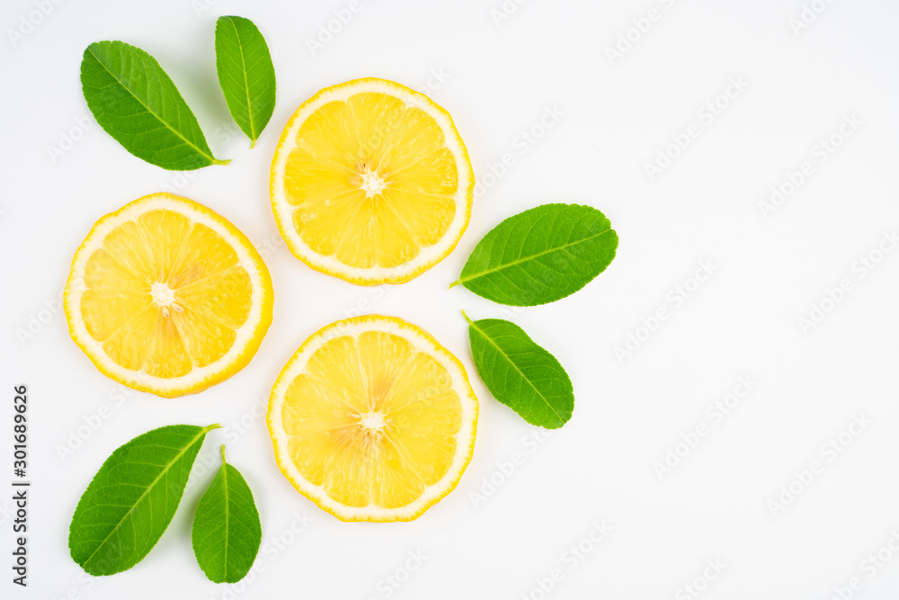 Fresh slice lemon with leaves, vitamin c supplement from natural  isolated on white background with copy space